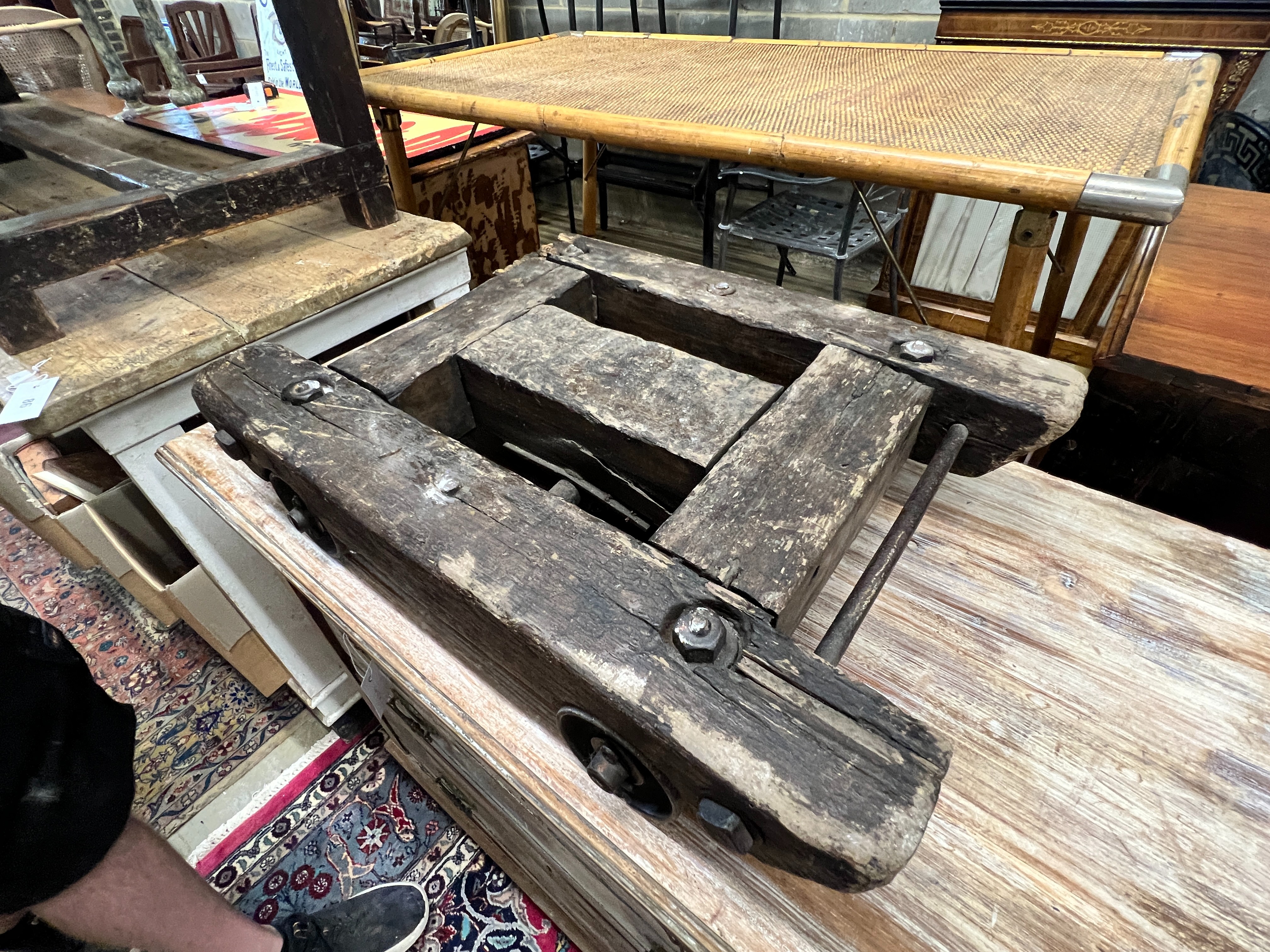 A vintage wooden trolley, width 57cm, height 40cm